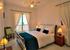 Double bedroom with en suite bath/shower with stunning sea views and the sounds of the sea.
