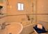 en suite bath/shower to the double room.  You can even see the sea whilst showering!