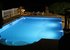 The pool at night at Araxa 4