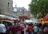 Shopping at bustling Josselin's street market