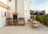 State of the art barbeque with dedicated outdoor dining patio tables.