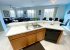 Kitchen appliances include dishwasher, cooker and freezer