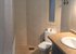 Bathroom with bath/shower, toilet & washbasin