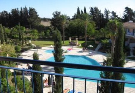 Apartment in Universal, Cyprus: View of pool from balcony