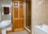 Standard bathroom with bath and separate shower