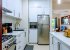 Stainless appliances - gas 6 burner stove and full size refrigerator.