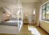 King size bedroom with ensuite and air-conditioning