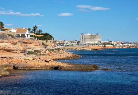 House in La Cuerda y Lomas de Cabo Roig, Spain: Orihuela, Spain - November 5, 2017: Rocky coastlin..