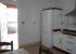 A view of the kitchen, showing the fridge-freezer.