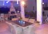 Downstairs Terrace at night, with BBQ and bar. 2021