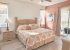 Master bedroom on main floor with king bed