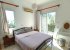 Second bedroom with a balcony