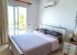 Master bedroom with ensuite bathroom and balcony