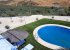 A view of the pool and garden from above.