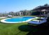 A view of the pool and garden from outside the downstairs kitchen.