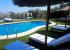 A view across the pool from outside the downstairs kitchen.