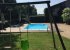The pool and swings for the kids