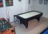 Games Room with air hockey, foosball, and pool table.