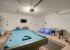 Games room with pool table and air hockey