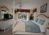 King-sized bed with TV and private balcon