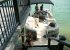 Pontoon boat docked at the Lake House