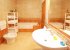 Spacious bathroom with a large shower and bathtub.