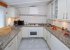 Spacious kitchen with lots of light and even sunshine.