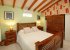 Spacious and comfortable master bedroom.