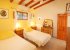 The second bedroom with 2 single beds & A/C, offers a good night sleep