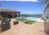 Take a swim while you look at the surroundings through a glass wall.