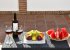 Enjoy a glass of wine and fruit from the campo!