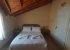 the bedroom with a double bed - comfortable bed - new bedding