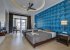 Blue bedroom with 2 single beds