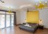 Yellow bedroom with attached bathroom