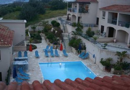 Town House in Tala, Cyprus: the swimming pool at night