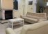 Living area with open fireplace