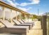 Sun loungers on the balcony