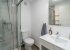 Second bathroom, both with showers.
