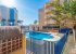 Outdoor area with swimming pool.