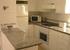 Fully fitted kitchen with granite work surfaces