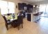 Fully equipped kitchen with breakfast bar and dining area