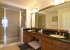 En suite with twin sinks & shower