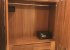 Large armoire with hangers, drawers and security safe