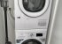 Laundry with washing machine, tumble dryer and vacuum cleaner