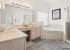 Master Bathroom with twin vanities, full Tub & walk in Shower