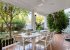 Dining table in the shade of the porch