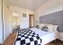 Ground floor double en-suite, patio doors to a terrace.