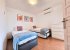 Ground floor 3 single beds. Patio doors to a terrace.