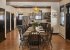 The hand-made dining room table can seat ten guests and is extra wide.