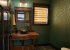 The powder room is adjacent to the mud room and kitchen. 